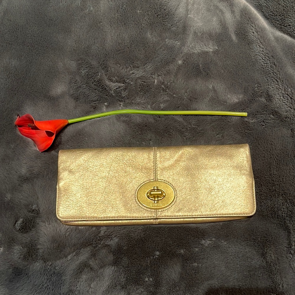 Coach gold clutch